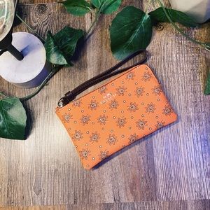 Coach wristlet NWT orange brown